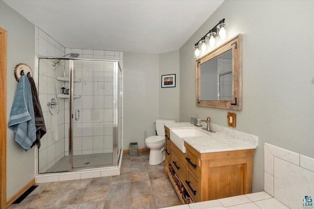 1505 Coachlight Crk, Proctor, MN 55810 - full bath with vanity, a stall shower, toilet, and baseboards