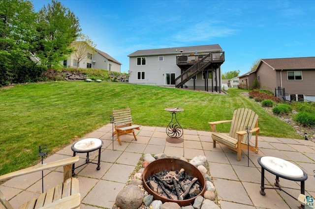 1505 Coachlight Crk, Proctor, MN 55810 - view of patio / terrace featuring a fire pit, stairway, and a wooden deck