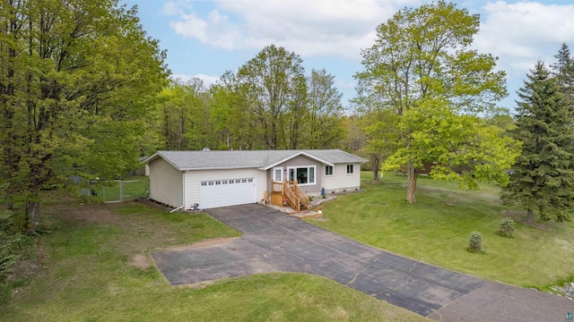 9211 W Skyline Pkwy, Duluth, MN 55810 - view of front of home with asphalt driveway and a garage