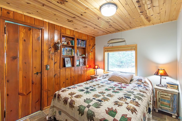 3984 Stocking Point Dr, Ely, MN 55731 - bedroom with wood walls and wood ceiling