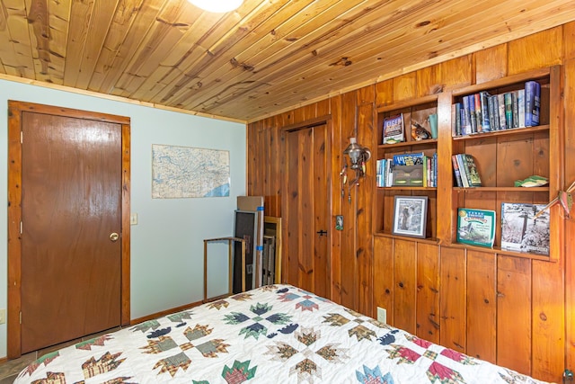 3984 Stocking Point Dr, Ely, MN 55731 - bedroom featuring wood ceiling, wooden walls, and two closets