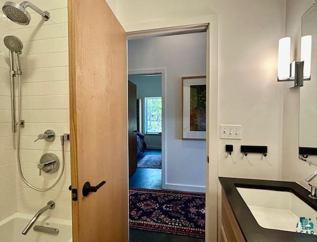 328 Gunflint Trl, Grand Marais, MN 55604 - full bath featuring vanity and shower / washtub combination