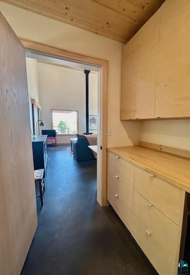 328 Gunflint Trl, Grand Marais, MN 55604 - corridor featuring finished concrete floors and wood ceiling