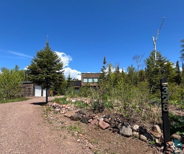 328 Gunflint Trl, Grand Marais, MN 55604 - view of yard featuring a detached garage