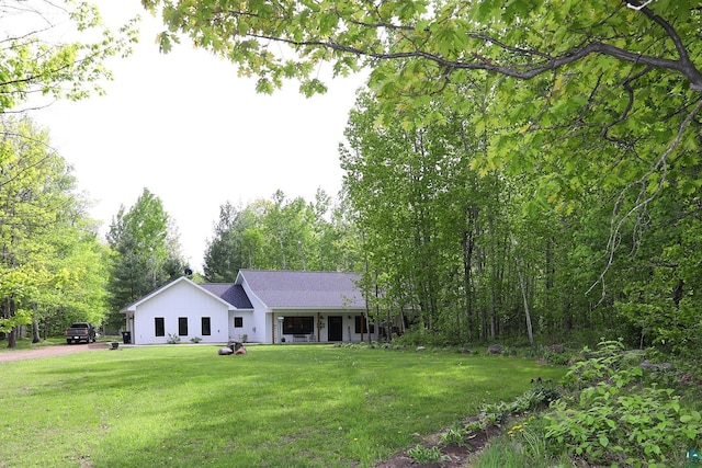 5004 W Rd, Moose Lake, MN 55767 - view of front of house featuring a front yard and driveway