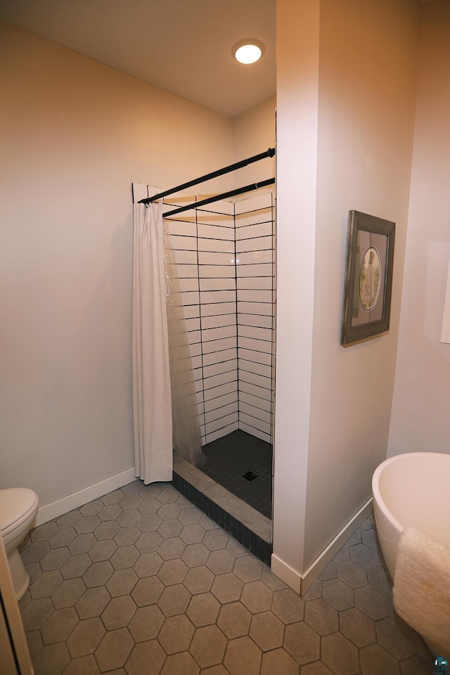5004 W Rd, Moose Lake, MN 55767 - bathroom with a shower stall, toilet, and baseboards