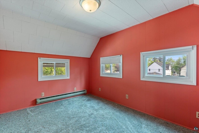 620 Hayes St, Eveleth, MN 55734 - unfurnished room featuring a baseboard radiator, carpet, and lofted ceiling