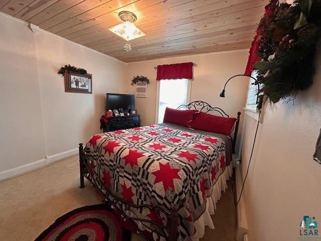 1601 W 4th Ave, International Falls, MN 56649 - carpeted bedroom with wooden ceiling and baseboards