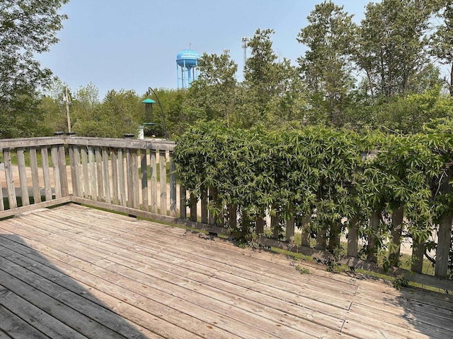 1601 W 4th Ave, International Falls, MN 56649 - wooden deck featuring view of wooded area
