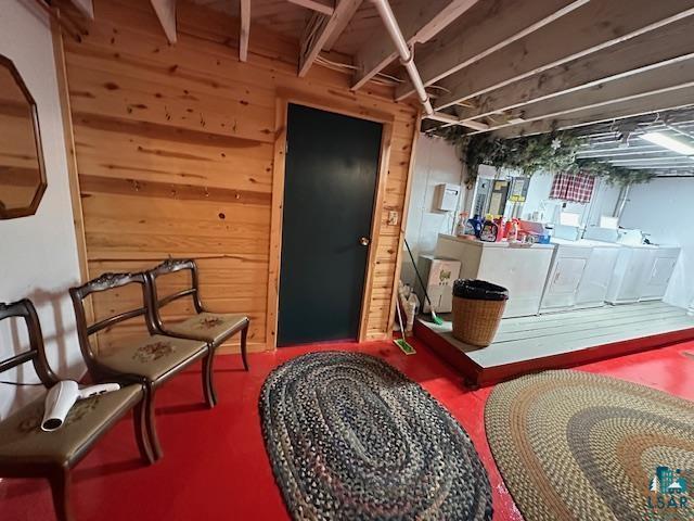 1601 W 4th Ave, International Falls, MN 56649 - reception area featuring wood walls and washer and clothes dryer