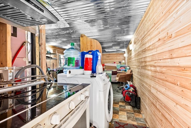 4605 Mccomber Rd, Duluth, MN 55803 - laundry area featuring wooden walls and washer / clothes dryer