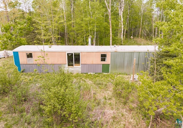 4605 Mccomber Rd, Duluth, MN 55803 - view of home's exterior with a wooded view
