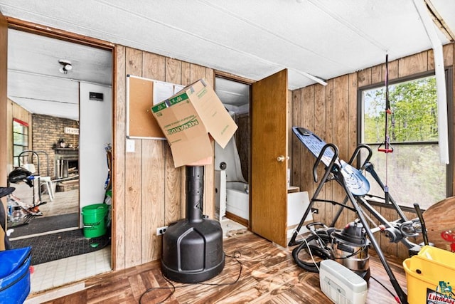 4605 Mccomber Rd, Duluth, MN 55803 - exercise area with wood walls and wood finished floors