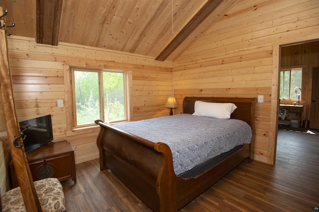 72 Sled Dog Trl, Hovland, MN 55604 - bedroom with multiple windows, wood walls, and dark wood finished floors