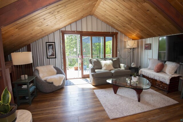 72 Sled Dog Trl, Hovland, MN 55604 - living room featuring vaulted ceiling, wooden ceiling, wood finished floors, and wood walls
