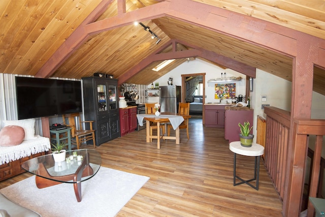 72 Sled Dog Trl, Hovland, MN 55604 - living area with light wood finished floors, vaulted ceiling, rail lighting, and wooden ceiling