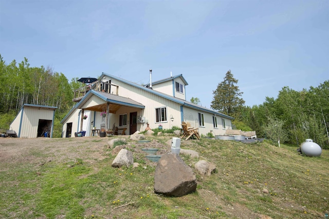72 Sled Dog Trl, Hovland, MN 55604 - rear view of house featuring an outdoor structure