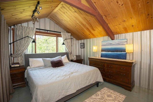 72 Sled Dog Trl, Hovland, MN 55604 - bedroom with vaulted ceiling, rail lighting, wood ceiling, and concrete floors
