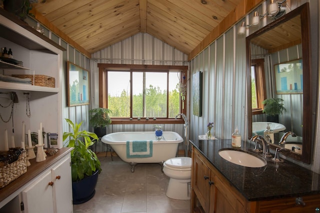 72 Sled Dog Trl, Hovland, MN 55604 - full bathroom with wooden ceiling, vaulted ceiling, a freestanding bath, vanity, and toilet