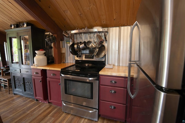 72 Sled Dog Trl, Hovland, MN 55604 - kitchen with appliances with stainless steel finishes, wooden ceiling, dark wood-style flooring, red cabinetry, and wooden counters