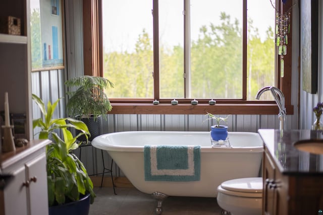 72 Sled Dog Trl, Hovland, MN 55604 - bathroom with healthy amount of natural light, a freestanding bath, and vanity