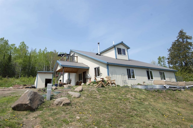 72 Sled Dog Trl, Hovland, MN 55604 - back of property featuring a yard