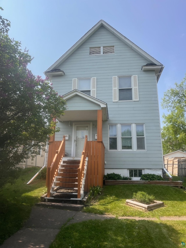 2213 W 10th St, Duluth, MN 55806 - view of front of home with a front lawn
