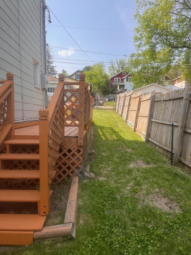2213 W 10th St, Duluth, MN 55806 - view of yard with stairway and a deck