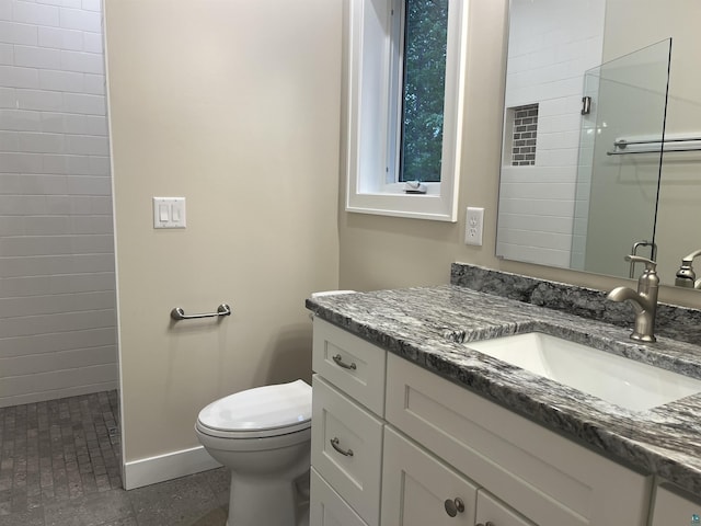 5036 W Arrowhead Rd, Hermantown, MN 55811 - bathroom featuring vanity and tiled shower