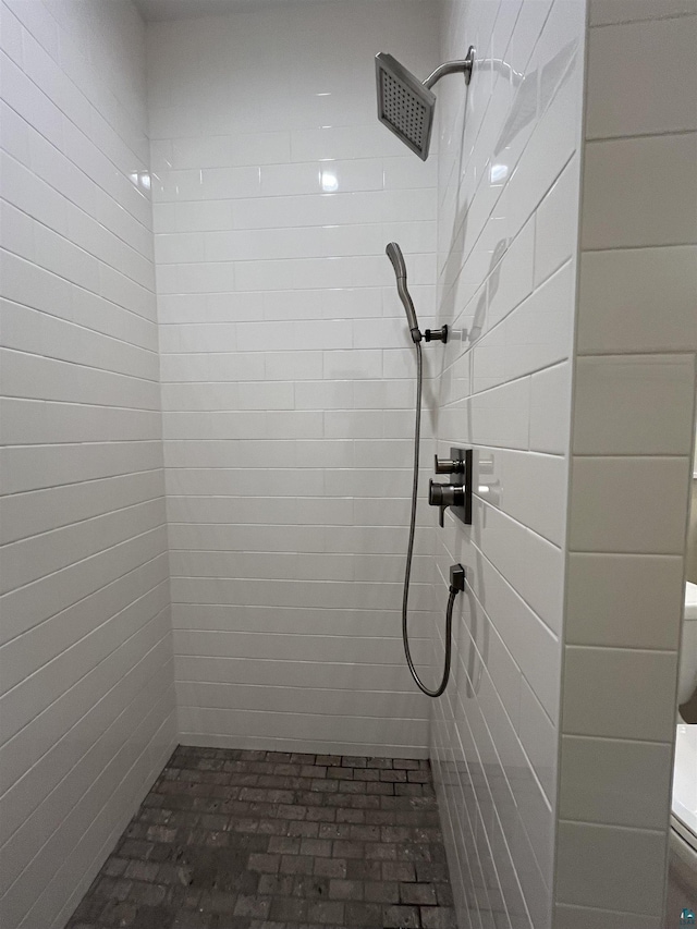 5036 W Arrowhead Rd, Hermantown, MN 55811 - bathroom with a tile shower and brick patterned flooring