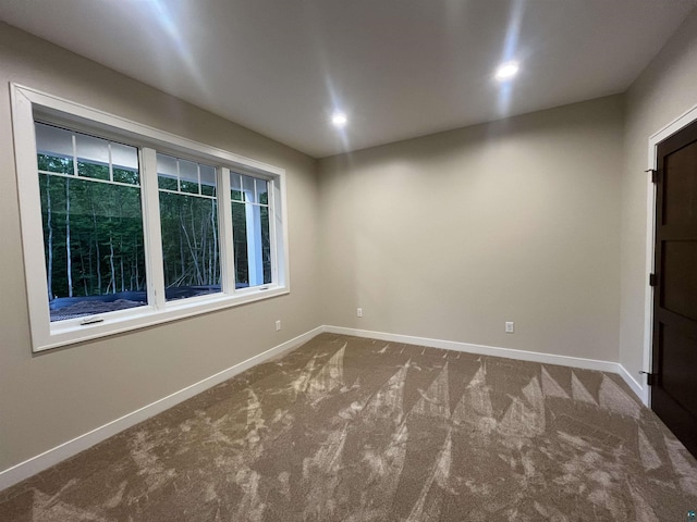 5036 W Arrowhead Rd, Hermantown, MN 55811 - carpeted empty room featuring baseboards and recessed lighting