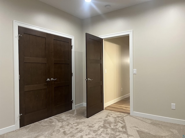 5036 W Arrowhead Rd, Hermantown, MN 55811 - unfurnished bedroom featuring carpet and a closet