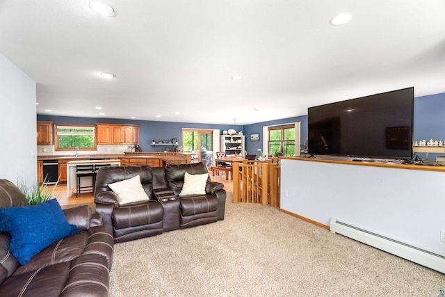 4409 Cedarway Rd, Duluth, MN 55810 - living area featuring baseboard heating, recessed lighting, and light carpet