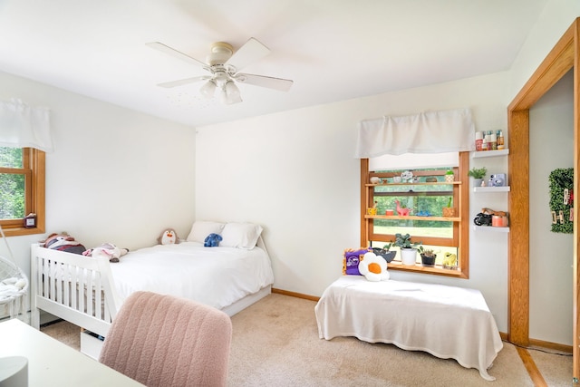 4409 Cedarway Rd, Duluth, MN 55810 - carpeted bedroom featuring ceiling fan and baseboards
