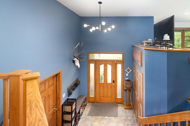 4409 Cedarway Rd, Duluth, MN 55810 - foyer featuring a chandelier and a towering ceiling