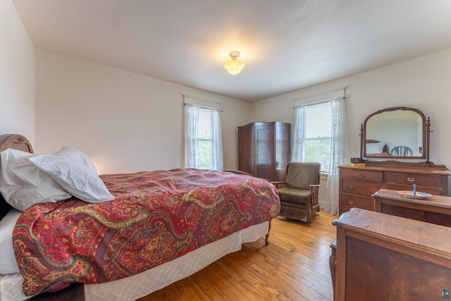1 W Railroad St, Ely, MN 55731 - bedroom with multiple windows and light wood-style floors