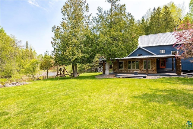 115 Copperhead Rd, Knife River, MN 55616 - view of grassy yard featuring covered porch