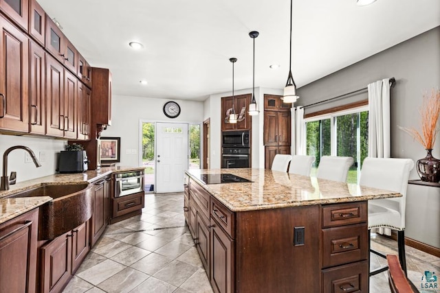 5386 Martin Rd, Duluth, MN 55811 - kitchen with black appliances, a sink, healthy amount of natural light, a kitchen island, and recessed lighting