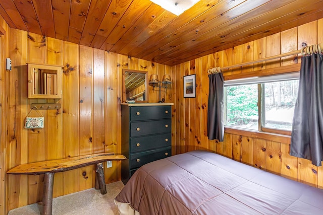 3666 Mackie Rd, Ely, MN 55731 - bedroom with carpet flooring, wood walls, and wooden ceiling