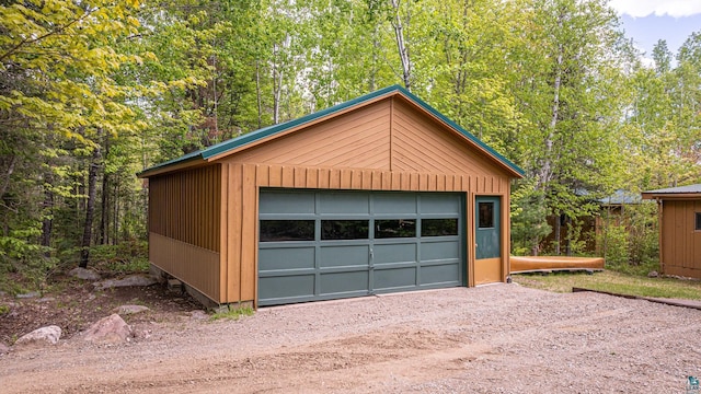 3666 Mackie Rd, Ely, MN 55731 - detached garage featuring a wooded view