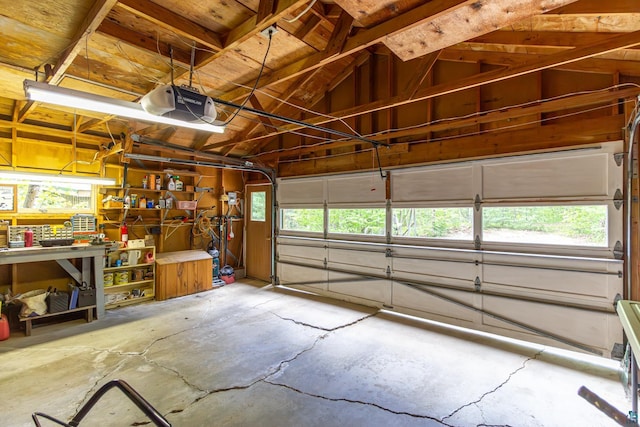 3666 Mackie Rd, Ely, MN 55731 - garage featuring a garage door opener