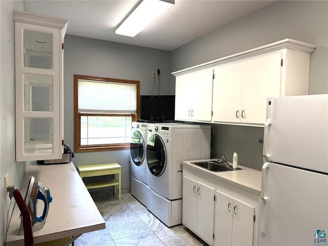 58950 State Highway 23, Sandstone, MN 55072 - laundry room featuring cabinet space and washer and dryer