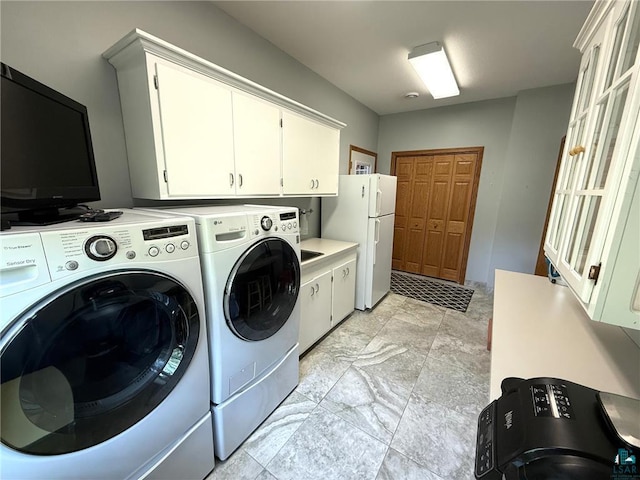 58950 State Highway 23, Sandstone, MN 55072 - washroom with cabinet space and independent washer and dryer