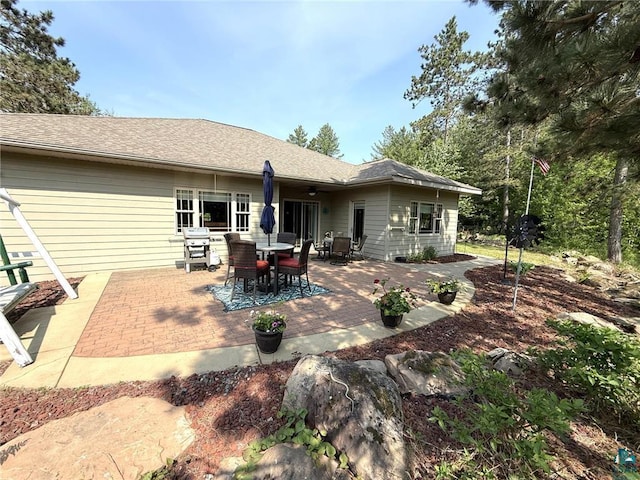 58950 State Highway 23, Sandstone, MN 55072 - rear view of property with a ceiling fan and a patio