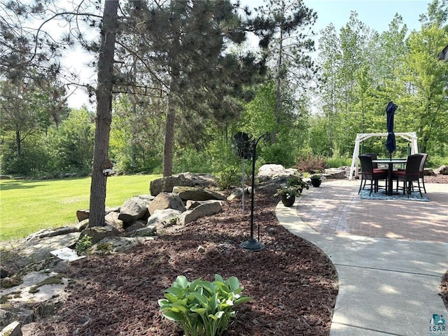 58950 State Highway 23, Sandstone, MN 55072 - view of property's community with a patio, a yard, and outdoor dining space