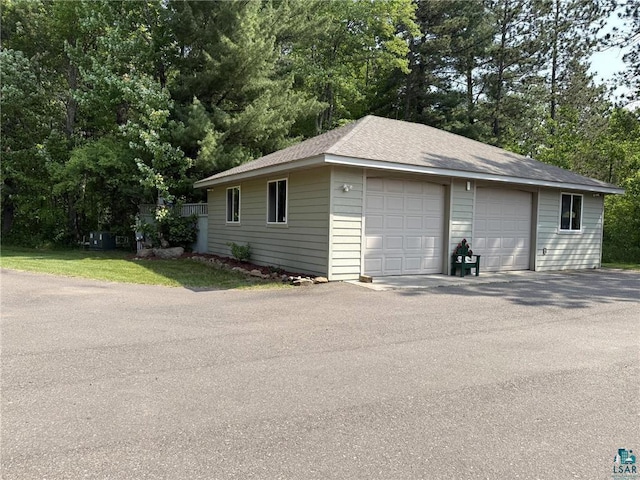 58950 State Highway 23, Sandstone, MN 55072 - detached garage featuring view of scattered trees