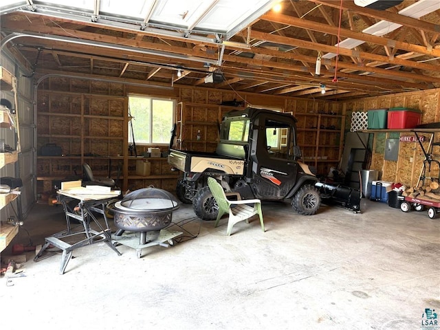 58950 State Highway 23, Sandstone, MN 55072 - garage featuring a garage door opener and electric panel