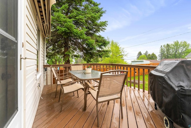 2006 Gearhart St, Duluth, MN 55811 - wooden terrace featuring grilling area and outdoor dining area