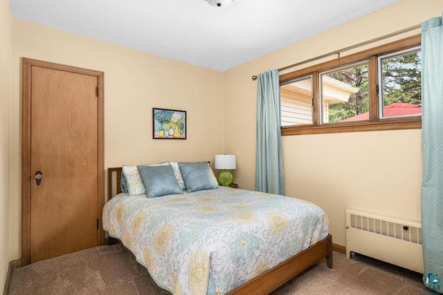 3319 E Superior St, Duluth, MN 55804 - carpeted bedroom featuring radiator and baseboards