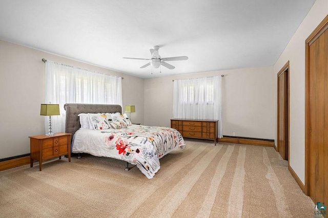 3319 E Superior St, Duluth, MN 55804 - bedroom with light carpet, multiple windows, and ceiling fan